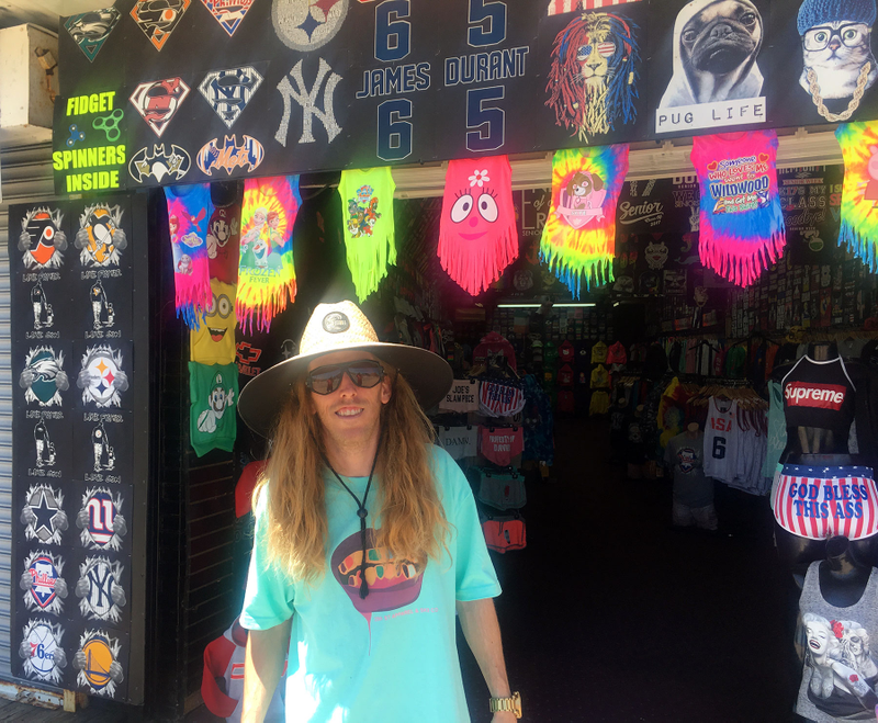 Maximilian Kelly in front of Mr. T’s, one of three boardwalk shops he has a stake in.